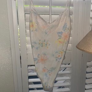 Beautiful pastel floral color tie dye pink brand by VS bodysuit thong style